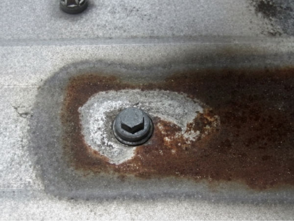 Rust around fastener on metal roof panel