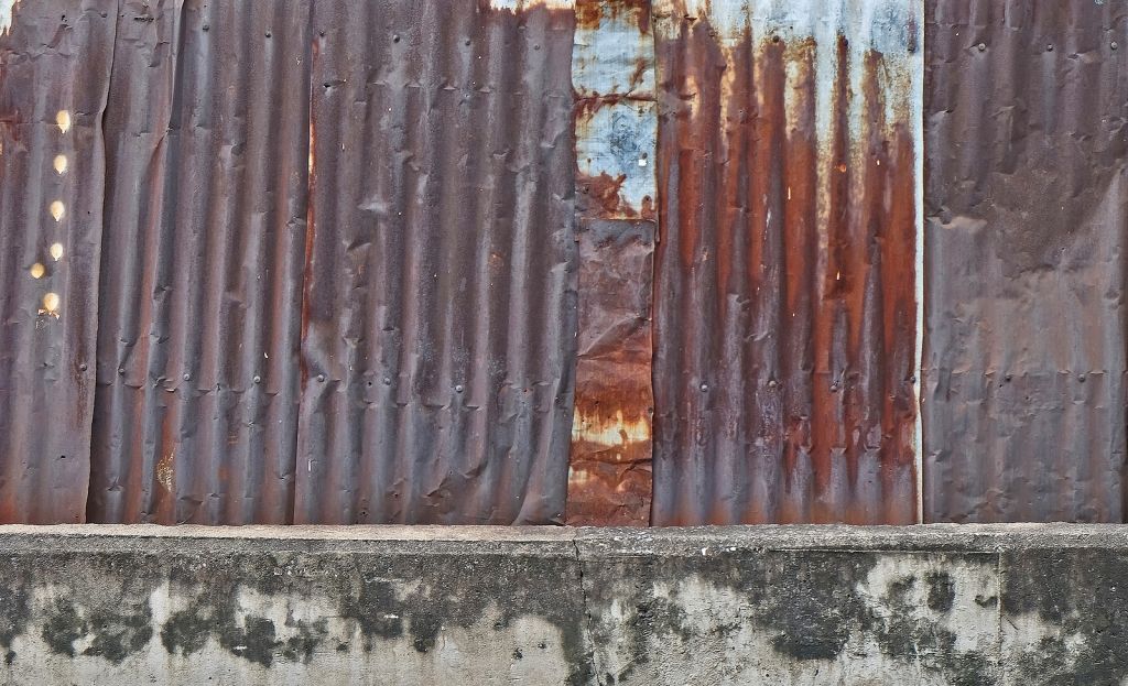 Kelly Roofing Metal Roof - Damaged Metal Roof