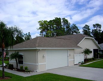 Shingle roof on light colored home