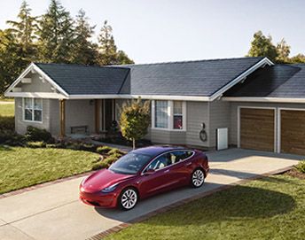 Home with red car in driveway