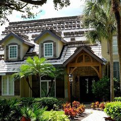 Decorative home with tile roofing