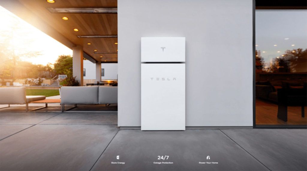 A Tesla Powerwall outside of a home.