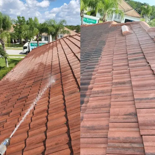 Spraying roof tiles with cleaner
