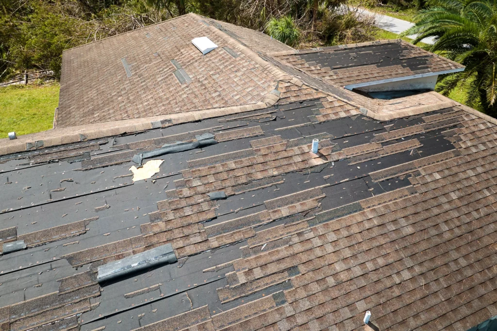 Shingle roof extensive damage, lots of missing shingles