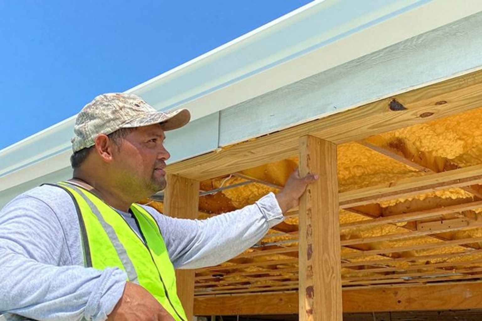 user-inserted Gutters being installed in new home