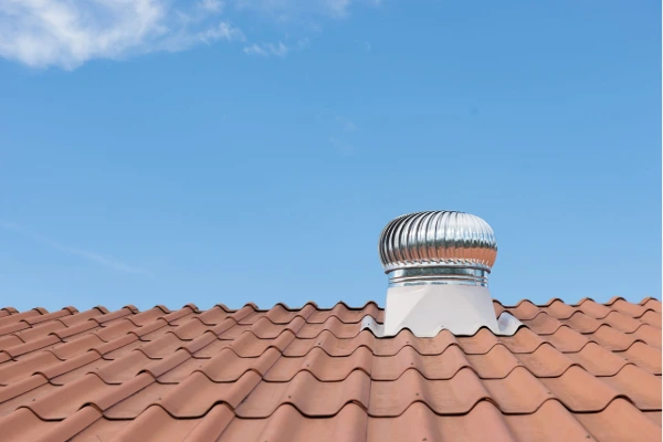Turbine roof vent on a tile roof, supporting attic airflow and ventilation for a Southwest Florida home
